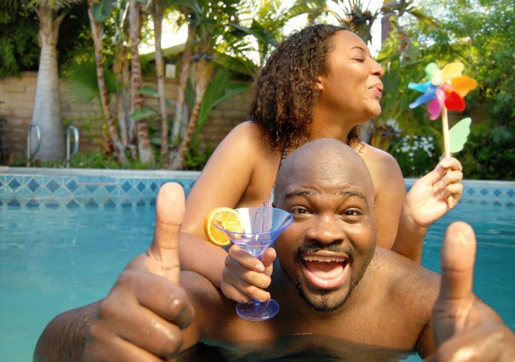 African Couple in Pool
